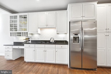 Welcome home! This luxurious Natelli-built  townhome in the on TPC Potomac At Avenel in Maryland - for sale on GolfHomes.com, golf home, golf lot