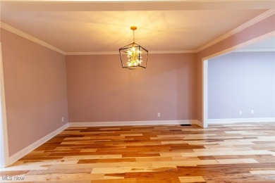 Highly desirable North Hudson condominium overlooking the 10th on The Country Club of Hudson in Ohio - for sale on GolfHomes.com, golf home, golf lot
