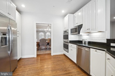 Welcome home! This luxurious Natelli-built  townhome in the on TPC Potomac At Avenel in Maryland - for sale on GolfHomes.com, golf home, golf lot
