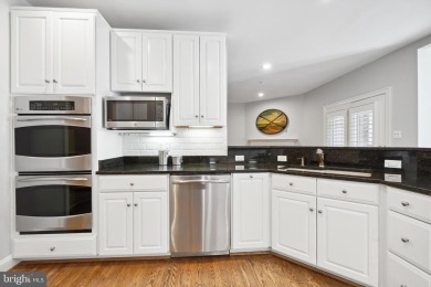 Welcome home! This luxurious Natelli-built  townhome in the on TPC Potomac At Avenel in Maryland - for sale on GolfHomes.com, golf home, golf lot