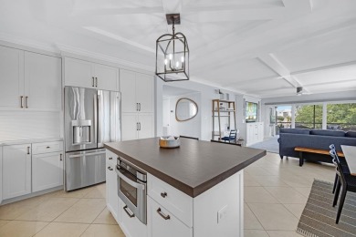This sought after first floor Fairway Lakes corner unit has on Ocean Reef Club in Florida - for sale on GolfHomes.com, golf home, golf lot