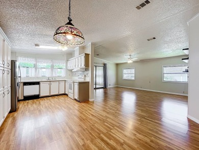 (ver mas abajo en espanol) Welcome to affordable 55+ living at on Lakes at Leesburg Golf Course in Florida - for sale on GolfHomes.com, golf home, golf lot