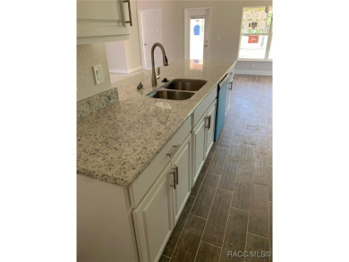 SELLER PROMO ON THIS POPULAR 1970 PLAN ON THE GOLF COURSE!! THIS on Twisted Oaks Golf Club in Florida - for sale on GolfHomes.com, golf home, golf lot