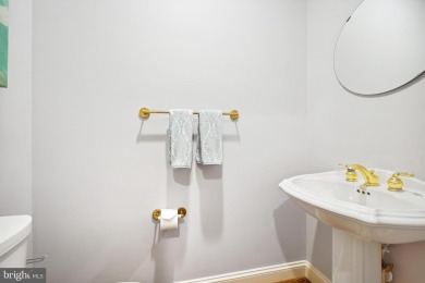 Welcome home! This luxurious Natelli-built  townhome in the on TPC Potomac At Avenel in Maryland - for sale on GolfHomes.com, golf home, golf lot