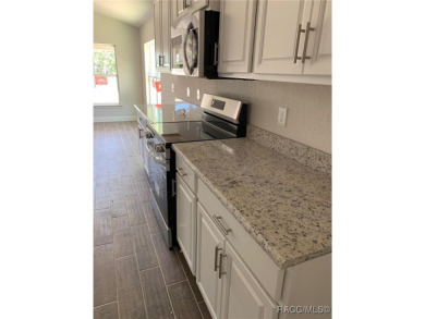 SELLER PROMO ON THIS POPULAR 1970 PLAN ON THE GOLF COURSE!! THIS on Twisted Oaks Golf Club in Florida - for sale on GolfHomes.com, golf home, golf lot