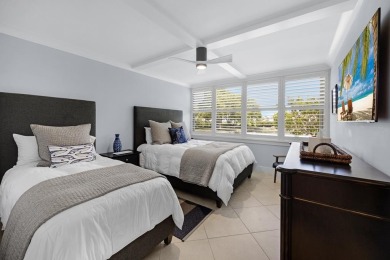 This sought after first floor Fairway Lakes corner unit has on Ocean Reef Club in Florida - for sale on GolfHomes.com, golf home, golf lot