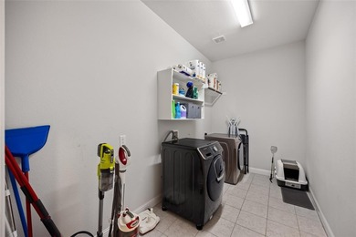 Life at 2212 Brooks Trail is defined by ease, energy, and access on Heath Golf and Yacht Club in Texas - for sale on GolfHomes.com, golf home, golf lot