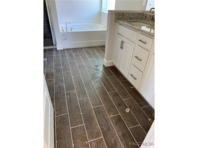 SELLER PROMO ON THIS POPULAR 1970 PLAN ON THE GOLF COURSE!! THIS on Twisted Oaks Golf Club in Florida - for sale on GolfHomes.com, golf home, golf lot