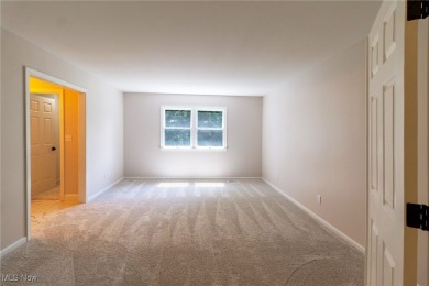 Highly desirable North Hudson condominium overlooking the 10th on The Country Club of Hudson in Ohio - for sale on GolfHomes.com, golf home, golf lot