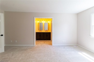 Highly desirable North Hudson condominium overlooking the 10th on The Country Club of Hudson in Ohio - for sale on GolfHomes.com, golf home, golf lot