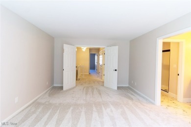 Highly desirable North Hudson condominium overlooking the 10th on The Country Club of Hudson in Ohio - for sale on GolfHomes.com, golf home, golf lot