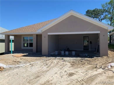 SELLER PROMO ON THIS POPULAR 1970 PLAN ON THE GOLF COURSE!! THIS on Twisted Oaks Golf Club in Florida - for sale on GolfHomes.com, golf home, golf lot