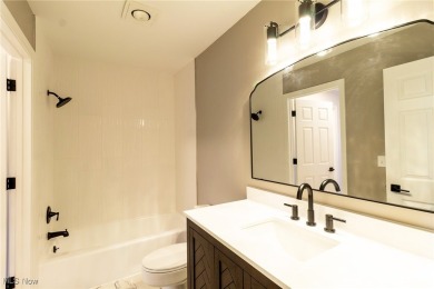 Highly desirable North Hudson condominium overlooking the 10th on The Country Club of Hudson in Ohio - for sale on GolfHomes.com, golf home, golf lot