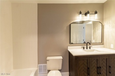 Highly desirable North Hudson condominium overlooking the 10th on The Country Club of Hudson in Ohio - for sale on GolfHomes.com, golf home, golf lot