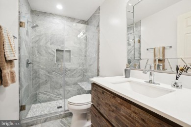 Welcome home! This luxurious Natelli-built  townhome in the on TPC Potomac At Avenel in Maryland - for sale on GolfHomes.com, golf home, golf lot