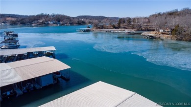 A Hyd-A-Way Cove Condominium is a RARE OPPORTUNITY! The complex on The Club At Old Kinderhook in Missouri - for sale on GolfHomes.com, golf home, golf lot