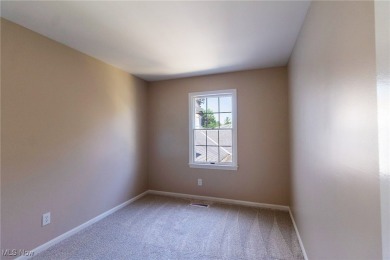 Highly desirable North Hudson condominium overlooking the 10th on The Country Club of Hudson in Ohio - for sale on GolfHomes.com, golf home, golf lot