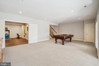 Welcome home! This luxurious Natelli-built  townhome in the on TPC Potomac At Avenel in Maryland - for sale on GolfHomes.com, golf home, golf lot