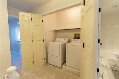 Highly desirable North Hudson condominium overlooking the 10th on The Country Club of Hudson in Ohio - for sale on GolfHomes.com, golf home, golf lot