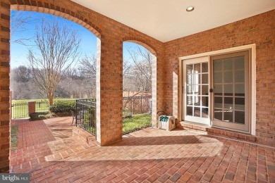 Welcome home! This luxurious Natelli-built  townhome in the on TPC Potomac At Avenel in Maryland - for sale on GolfHomes.com, golf home, golf lot