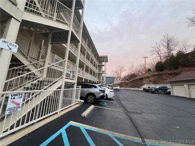 A Hyd-A-Way Cove Condominium is a RARE OPPORTUNITY! The complex on The Club At Old Kinderhook in Missouri - for sale on GolfHomes.com, golf home, golf lot