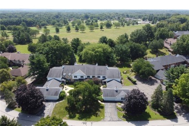Highly desirable North Hudson condominium overlooking the 10th on The Country Club of Hudson in Ohio - for sale on GolfHomes.com, golf home, golf lot