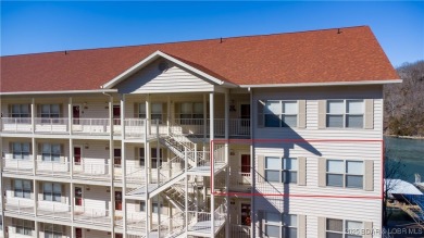 A Hyd-A-Way Cove Condominium is a RARE OPPORTUNITY! The complex on The Club At Old Kinderhook in Missouri - for sale on GolfHomes.com, golf home, golf lot
