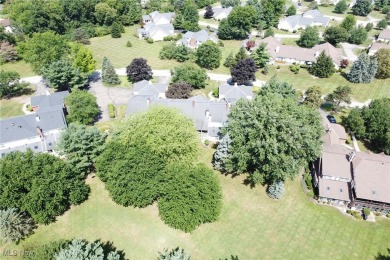 Highly desirable North Hudson condominium overlooking the 10th on The Country Club of Hudson in Ohio - for sale on GolfHomes.com, golf home, golf lot