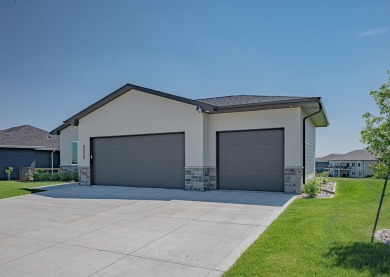 Welcome to this stunning, modern home located in the highly on Whispering Creek Golf Club in Iowa - for sale on GolfHomes.com, golf home, golf lot