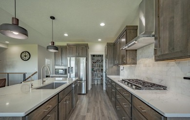 Welcome to this stunning, modern home located in the highly on Whispering Creek Golf Club in Iowa - for sale on GolfHomes.com, golf home, golf lot