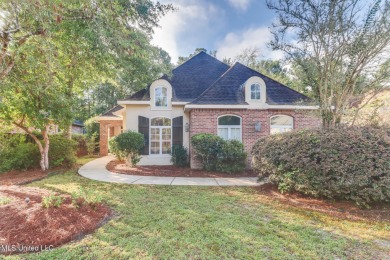 This beautiful Custom Home in Diamondhead has elegant upgrades on Diamondhead Country Club in Mississippi - for sale on GolfHomes.com, golf home, golf lot
