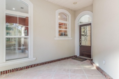 This beautiful Custom Home in Diamondhead has elegant upgrades on Diamondhead Country Club in Mississippi - for sale on GolfHomes.com, golf home, golf lot