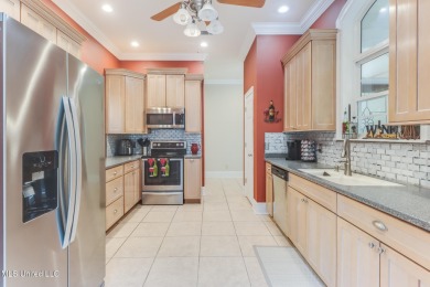 This beautiful Custom Home in Diamondhead has elegant upgrades on Diamondhead Country Club in Mississippi - for sale on GolfHomes.com, golf home, golf lot