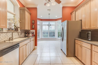 This beautiful Custom Home in Diamondhead has elegant upgrades on Diamondhead Country Club in Mississippi - for sale on GolfHomes.com, golf home, golf lot