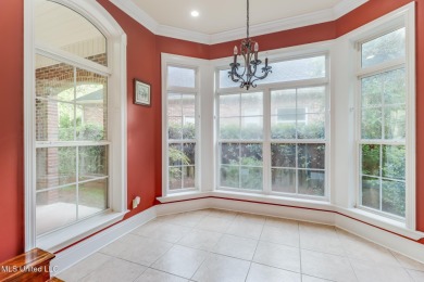 This beautiful Custom Home in Diamondhead has elegant upgrades on Diamondhead Country Club in Mississippi - for sale on GolfHomes.com, golf home, golf lot
