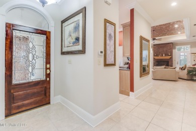 This beautiful Custom Home in Diamondhead has elegant upgrades on Diamondhead Country Club in Mississippi - for sale on GolfHomes.com, golf home, golf lot