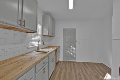 Check out this adorable home in Waterside near Ki Mexico on Querbes Park Golf Course in Louisiana - for sale on GolfHomes.com, golf home, golf lot