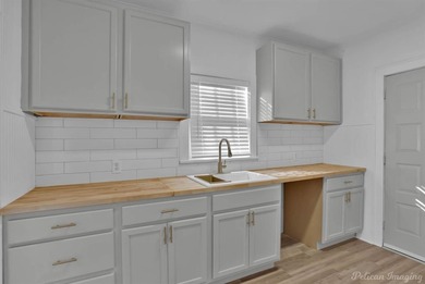 Check out this adorable home in Waterside near Ki Mexico on Querbes Park Golf Course in Louisiana - for sale on GolfHomes.com, golf home, golf lot