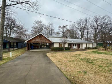 This stunningly renovated 5-bedroom, 3-bath ranch-style home on Lake Bruin Golf and Country Club in Louisiana - for sale on GolfHomes.com, golf home, golf lot