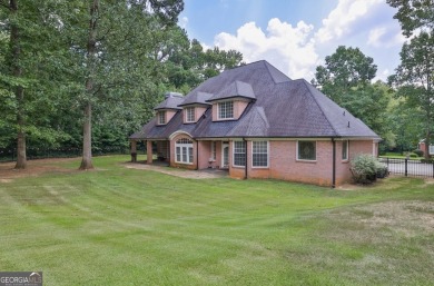 Luxurious Custom-Built Estate in Lake Spivey Country Club on Lake Spivey Golf Club in Georgia - for sale on GolfHomes.com, golf home, golf lot