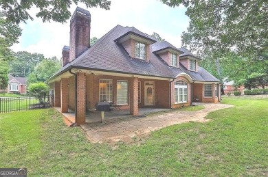 Luxurious Custom-Built Estate in Lake Spivey Country Club on Lake Spivey Golf Club in Georgia - for sale on GolfHomes.com, golf home, golf lot