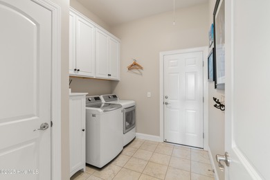 Discover exceptional living in this move-in ready, single-story on Compass Pointe Golf Course in North Carolina - for sale on GolfHomes.com, golf home, golf lot