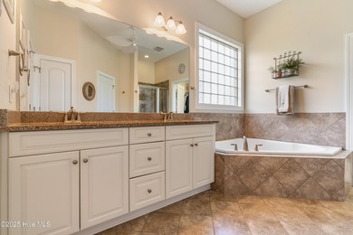 Discover exceptional living in this move-in ready, single-story on Compass Pointe Golf Course in North Carolina - for sale on GolfHomes.com, golf home, golf lot