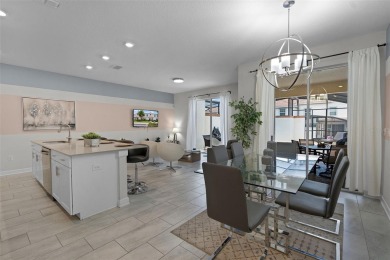 Discover the perfect blend of comfort, style, and location at on The Oasis Club at Champions Gate in Florida - for sale on GolfHomes.com, golf home, golf lot