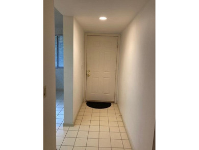 THIS 2/2  SPACIOUS AND PRISTINE CONDO IS MOVE IN READY.FIRST on Bear Lakes Country Club in Florida - for sale on GolfHomes.com, golf home, golf lot