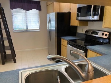 THIS 2/2  SPACIOUS AND PRISTINE CONDO IS MOVE IN READY.FIRST on Bear Lakes Country Club in Florida - for sale on GolfHomes.com, golf home, golf lot