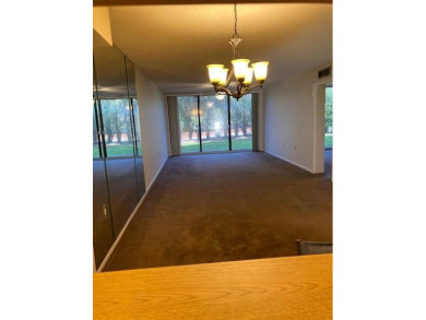 THIS 2/2  SPACIOUS AND PRISTINE CONDO IS MOVE IN READY.FIRST on Bear Lakes Country Club in Florida - for sale on GolfHomes.com, golf home, golf lot