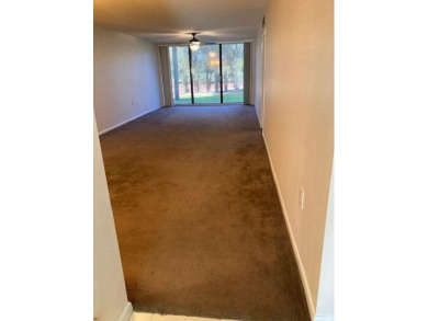 THIS 2/2  SPACIOUS AND PRISTINE CONDO IS MOVE IN READY.FIRST on Bear Lakes Country Club in Florida - for sale on GolfHomes.com, golf home, golf lot