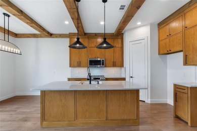 Step into this beautiful townhouse, where luxury meets charm. As on Heath Golf and Yacht Club in Texas - for sale on GolfHomes.com, golf home, golf lot