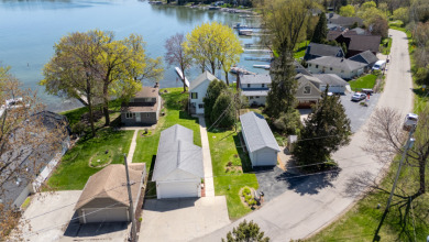 Dock your dreams on Big Cedar Lake! on West Bend Country Club in Wisconsin - for sale on GolfHomes.com, golf home, golf lot